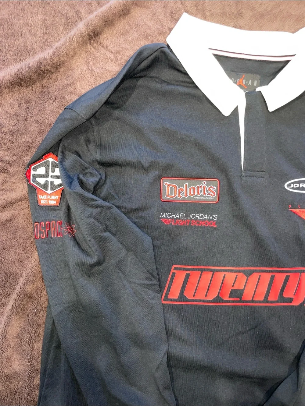 Jordan Black Long-Sleeve Rugby Polo with Red Accents and White Collar